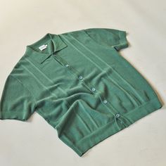 Is Hunter Green And Never Worn! The Color Looks Like The Photos On The Model. Is Wrinkly Since It Was In A Bag. Husband Bought And Never Worn. Is Such A Nice Shirt! Casual Green Short Sleeve Polo Sweater, Green Tops With Ribbed Collar And Short Sleeves, Green Short Sleeve Top With Ribbed Collar, Green Top With Ribbed Collar And Short Sleeves, Green Cotton Short Sleeve Polo Sweater, Green Ribbed Collar Top For Summer, Summer Green Top With Ribbed Collar, Green Collared Knit Top, Green Knit Collared Tops