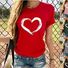 This Classic Tee Features White Heart Graphic, Crew Neck, Short Sleeves And Lightweight, Soft, Material That Is Not See Through. Size S Approx Bust 18" Length 24" Size M Approx Bust 19" Length 25" Casual Red T-shirt With Heart Graphic, Red Heart-shaped Top With Graphic Print, Trendy Red Top With Heart Print, Red Heart-shaped T-shirt With Heart Graphic, Red Crew Neck Top With Heart Graphic, Red Cotton T-shirt With Heart Print, Casual Red Top With Heart Graphic, Red Short Sleeve T-shirt With Heart Print, Red Heart Print Casual Top