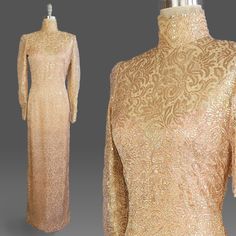 ~1980s Saks Fifth Avenue gold metallic lace evening gown with stand collar and long sleeves ~Gold metallic floral lace lays over a peach crepe lining, giving it a rose gold effect ~Crepe lining has sweetheart neckline, creating a subtle illusion bodice  ~Lots of hand sewn details and finished seams ~Sleeves have zippers at openings  ~Back nylon zipper closure with hook and eye closure on stand collar Size - Medium  Bust - 35" Waist - 28" Hip - 38" Length - 60" Label: Saks Fifth Avenue Condition: Vintage Long Sleeve Evening Dress, Festive Vintage Evening Dress, Vintage Long Sleeve Evening Dress For Formal Occasions, Vintage Formal Evening Dress For Festive Occasions, Vintage Festive Formal Evening Dress, Vintage Formal Festive Evening Dress, Vintage Long Sleeve Wedding Evening Dress, Vintage Gold Long Sleeve Dress, Vintage Gold Evening Dress For Gala