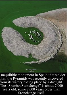 an aerial view of rocks and water with the caption's quote about magnetic moment in spain that older than the pyramids was recently uncovered from its watery hiding place