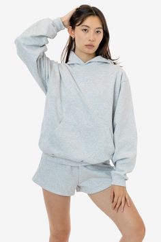 Made from a luxurious 14oz fleece, this hoodie is incredibly soft and warm, yet still breathable and moisture-wicking. The loose fit allows for a full range of motion, making it perfect for everything from running errands to lounging around the house. The kangaroo pocket provides ample storage for your essentials, while the ribbed cuffs and hem keep the cold out. This hoodie is Piece Dyed. Our piece-dyed hoodies fabric is dyed before they're cut and sewn, which results in a more uniform color di Study Clothes, Zombie Fashion, Hoodie Styling, Exercise Clothes, Denim Short Jumpsuit, Los Angeles Apparel, Garment Manufacturing, Dye Colors, White Denim Jacket