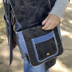 Urban Style Upcycled Denim Crossbody Bag This eco-friendly unisex messenger bag blends the carefree elegance of a boho purse with a practical design. Each handmade bag showcases the rugged, casual beauty of upcycled denim, making it an ideal travel companion for those who treasure unique style and durability. Embrace the versatility of a shoulder bag with the earth-conscious statement of an eco-friendly bag. Perfect for anyone on the go, this denim purse is not just a fashion statement it's a co Denim Crossbody Bag, Boho Purse, Denim Crossbody, Denim Purse, Hippie Bags, Eco Friendly Bags, Boho Purses, Upcycled Denim, Handmade Bag