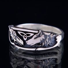 Silver ring dragon and wolf Silver Wolf Design Ring As Gift, Wolf Design Ring Jewelry Gift, Wolf Design Ring Jewelry For Gift, Silver Ring With Wolf Design, Silver Wolf Design Symbolic Jewelry, Silver Symbolic Wolf Design Jewelry, Symbolic Silver Wolf Design Jewelry, Viking Style Silver Jewelry With Wolf Design, Viking Style Silver Wolf Design Jewelry