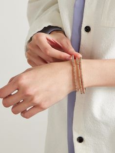 Roxanne Assoulin's set of three bracelets is strung with slim gold-tone beads that mimic the weave of corduroy fabric. Their delicate and minimal feel makes them perfect for mixing with other styles from the label. Gold Hand-strung Braided Bracelets, Rose Gold Hand-strung Bracelets, The Row Bag, Roxanne Assoulin, Latest Bracelets, Fabric Bracelets, Designer Bracelets, Brown Bracelet, Corduroy Fabric