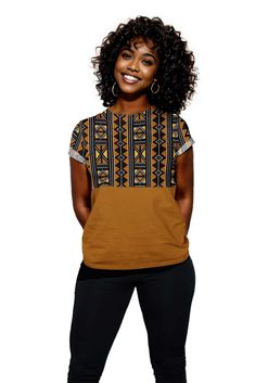 This Mixed African Tribal Print Women T-shirt is a stylish addition to your wardrobe. Made from high-quality fabric, it features a unique mix of vibrant tribal prints that offer a one-of-a-kind look. Perfect for any occasion, this shirt is comfortable and full of character. Product Features Please Compare your Measurements To our Size Chart This T-shirt is Designed for fashionable women. Made from 5.47 Oz. 100% polyester. Double-needle hemmed sleeves and bottom. Vivid print that will never fade Brown Cotton Printed Tops, Black Cotton Tops With Geometric Pattern, Black Cotton Top With Geometric Pattern, Black Short Sleeve Tops With Geometric Pattern, Bohemian Cotton Top With Geometric Pattern, Short Sleeve Graphic Tee With Abstract Print, Casual Patterned Tops With Unique Print, Casual Tops With Unique Patterned Print, Casual Short Sleeve Tops With Unique Print