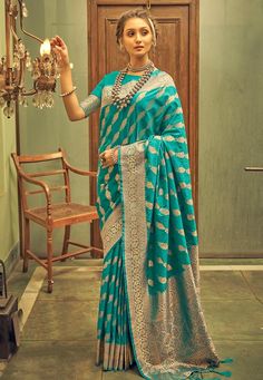 Banarasi silk Saree with blouse in Sky blue colour 20005  Desc:  Style : Banarasi Sarees Color : Sky Blue Fabric : Banarasi Silk Wash Care : Dry clean Sleeve Style : Half Sleeve Long Sleeves : Done only in Custom Stitch Sleeves Lining : Done only in Custom Stitch Bust Size : 32 to 42 Inches Occasion : Engagement   Wedding   Diwali   Mehendi   Sangeet   Ceremonial   Dussehra. With Express Free Shipping and Custom Stitching, Buy Indian Party wedding wear Bridal Sarees Banarasi silk Saree with blou Sky Blue Banarasi Saree, Banarasi Saree Look For Wedding, Blue Banarasi Saree, Blue Banarasi Silk Saree, Pola Blus, Indowestern Gowns, Sky Blue Fabric, Sky Blue Colour, Banaras Sarees