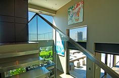 Hollywood Hills modern LA home stairway art gallery with glass walls & tons of natural light. Swimming Pool Spa