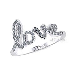 a white gold ring with the word love surrounded by small round diamonds on an adjustable band