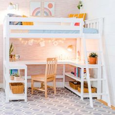 a white bunk bed sitting next to a desk and chair