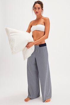 Have a casual cool moment in these comfy lounge pants from Intimately, featured in the softest cotton blend with a micro-stripe pattern for endless wear in or outside the house. **Fit:** Relaxed, wide-leg, high-rise **Features:** Soft cotton blend, adjustable drawstring waistband, ribbed waistband details, micro-striped pattern **Why We | Out And About Pants by Intimately at Free People in Blue, Size: L Comfy Lounge Pants, Logo Pants, Comfy Lounge, Out And About, Bottom Clothes, Navy Stripes, Drawstring Waistband, Navy Color, Lounge Pants