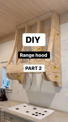 the diy range hood part 2 is made from plywood planks and wood