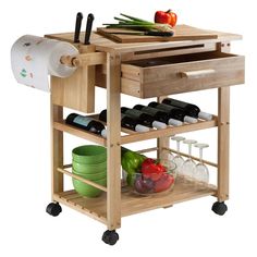 a kitchen cart with wine bottles, bowls and utensils on it's wheels