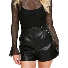 Faux Leather Studded Shorts. Measurements: Waist: 14”, Inseam: 3”. Size Medium Edgy Black Shorts For Going Out, Edgy Fall Club Bottoms, Fall High-waisted Faux Leather Shorts, Fall Faux Leather High-waisted Shorts, Short Length Bottoms For Date Night In Fall, Short-length Bottoms For Date Night And Fall, Edgy Shorts For Night Out, Date Night Fall Shorts, Edgy High Waist Faux Leather Bottoms