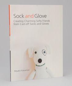 a book with a white dog on it