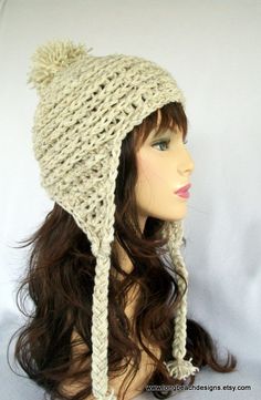 a mannequin head wearing a knitted hat