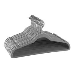 a set of silver clothes hangers sitting on top of each other in front of a white background