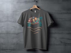 953a8da8-775d-4e1c-a9e0-0dd82d130663 Bohemian Multicolor T-shirt For Beach, Multicolor Bohemian T-shirt For The Beach, Tropical Relaxed Fit T-shirt For Surfing, Beach Wardrobe, Ocean Life, Staple Pieces, Unisex Design, Sea Turtle, Boho Chic