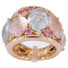 This exquisite rose gold ring by Crivelli is a captivating piece adorned with a brilliant array of gemstones. The 0.24-carat diamonds, cut to perfection in brilliant style, showcase a stunning D-E color and VVS clarity, ensuring a mesmerizing sparkle. The focal point of the ring is the baroque gemstones, featuring a delightful mix of pink and blue hues totaling 12.62 carats, complemented by a 0.67-carat sapphire. The ring, weighing 17.8 grams, is crafted from 18K rose gold 750, adding a warm and Ring Rosegold, Blue Gemstones, Blue Hues, Brilliant Colors, 18k Rose Gold, Rose Gold Ring, Or Rose, Gold Ring, Fashion Rings