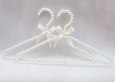 10 Pack Pearl Beads Metal Elegant Clothes Hangers Standard Hangers (White) Elegant Design: Round metal hangers with pearl beads for a stylish look Durable Material: Made from metal and plastic for long-lasting use Multiple Uses: Can be used for hanging clothes, scarves, bags, and more Compact Size: Measures 16 inches with 10 hangers for convenient storage Brand Name: Part of the BUUEERR brand's collection of home accessories Pearl hangers is luxury,top quality transparent beads decoration. Shipping We offer FREE shipping on all orders! We ship within Three business days of payment, usually sooner. We use a selection of shipping services such as UPS, FedEx, USPS etc., unable to choose a carrier.  We only ship to the lower 48 states, no APO/FPO addresses or PO Boxes allowed. Sellers generall Coquette Pics, Pearl Hangers, Coquette Widgets, Moth Girl, Pearl Hanger, Tshirt Printing Business, Best Hangers, Magic Clothes, White Hangers