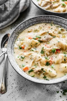 two bowls filled with chicken and dumpling soup