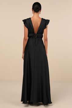 The Lulus I'm All Yours Black Satin Cutout Ruffled Maxi Dress is dedicated to making you look lovely! Sleek woven satin sweeps from ruffled, cap sleeves into a plunging V-neckline and matching V-back. A banded empire waist, with a set of tying details at the front and back, sits atop a cascading skirt that falls to an elegant maxi hem. Hidden back zipper/clasp. Fit: This garment fits true to size. Length: Floor length. Size medium measures 48.5" from shoulder to hem. Bust: Great for any cup size Wedding With Black Bridesmaid Dresses, Resort Formal, Satin Black Dress, Short Sleeve Bridesmaid Dress, Black Prom Dress Short, Winter Formal Dresses, Black Tie Gala, Maxi Skirt Dress, Black Satin Dress