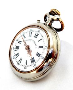 📢 Tell us what is your offer !  ⏬ Lower prices with discount every day ! Thank you for visiting our antique jewelry collection shop We now offer, for you to enjoy your collection, an excellent piece of high-end and Swiss watches On this occasion we offer for sale an antique open face pocket watch Brand:  ROSKOPF Model: Open Face Origin: Swiss Style: Art Deco Circa 1890 (watch 131 years old) Dial porcelain with Roman numerals, two color, signed ROSKOPF PATENT Case stainless steel, signed ROSKOPF Classic Hallmarked Round Pocket Watch, Vintage Round Pocket Watch With Polished Finish, Vintage Collectible Round Pocket Watch, Antique Collectible Pocket Watch With Round Dial, Vintage Hallmarked Round Pocket Watch, Husband Anniversary