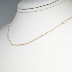 This delicate handmade necklace features 7 genuine Freshwater Pearls Gemstones wrapped in 14k Gold Filled or Sterling Silver made in the length of your choice. This dainty beaded necklace is easy to wear alone or layered with other necklaces. A classic and simple everyday piece that will make fashion look effortless. Customize yours by choosing your metal and length. This necklace design is also available in different gemstones. Makes a great gift to add to any gemstone lover's collection. Perfe Simple Gold Necklace, Dainty Pearl Necklace, Gold Necklace Simple, Handmade Beaded Necklaces, Bridesmaid Accessories, Jewelry Simple, Freshwater Pearl Necklace, Necklace Pearl, June Birthstone