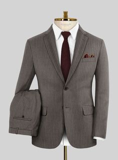 Get set to ace your upscale event with our Loro Piana Giovanni Wool Suit! Crafted impeccably from a luxurious wool blend, it's all about that soft touch and incredible comfort. With its brown hue and snazzy stripe pattern, this suit brings that extra oomph, perfect for flaunting your sophisticated side with a twist. So, own that charm, embrace this standout piece, and get ready to have everyone buzzing about your style prowess! 
  Choice of the Elite, Loro Piana is owned by LVMH Moët Hennessy Louis Vuitton SE, the French multinational luxury goods conglomerate, who is parent to the world's most luxurious brands ranging from Louis Vuitton, Christian Dior, Loewe, Givenchy, Celine and many more.  Look Includes    Loro     Piana     Giovanni     Wool  Fabric  Two Button Jacket Style  Notch Lap Brown Single Breasted Business Sets, Brown Tailored Sets With Suit Collar, Brown Formal Suiting Fabric Set, Formal Brown Suiting Fabric Set, Elegant Single-breasted Brown Sets, Brown Fitted Business Sets, Brown Long Sleeve Suit With Pressed Crease, Brown Long Sleeve Business Sets, Brown Suits With Pressed Crease