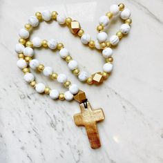 Beautiful prayer beads are made with 30 15mm silicone beads separated by shimmering gold beads. Handmade gold crosses adorn prayer beads. Perfect gift for weddings, baptisms, housewarming gift, and teacher presents! Color options are endless! Don’t see the color you are looking for? Message us! We can order it for you. *Please Note* We do our best to represent our prayer beads as accurately as possible. Colors may vary slightly between your computer and the final product you receive. Send us a m Gold Spiritual Rosary For Meditation, Gold Necklaces With 8mm Beads For Blessing, Gold Rosary With 8mm Beads For Meditation, Spiritual Rosary With Large Beads As Gift, Spiritual Gold Rosary With 8mm Beads, Adjustable Large Beads Rosary As Gift, Adjustable Rosary With Large Beads As Gift, Gold Rosary For Meditation, Spiritual Gold Jewelry With Wooden Beads