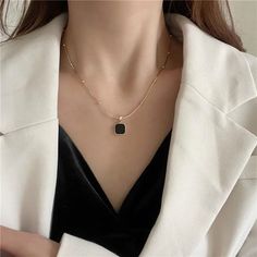 Description: Embrace luxurious elegance with our Black Square Pendent Necklace. Made with high quality materials, this necklace boasts an eye-catching gold plated pendant that elevates any outfit. The perfect addition to your jewelry collection, it adds a touch of sophistication and glamour to your style. Affordable Luxury Jewelry High-Quality Gold Plating Versatile for Daily Wear Perfect Gift for Women Quiet Luxury and Individuality Combined Oil Drip, Chains Fashion, Black Pendant Necklace, Necklaces Black, Square Necklace, Shopping Party, Moda Chic, Pendant Choker, Travel Shopping