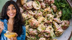 a woman holding a bowl of food and smiling