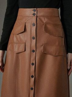 Fall Knee-length Mini Skirt With Pockets, Spring Faux Leather Skirt With Pockets, Brown Office Skirt With Pockets, Brown Office Mini Skirt For Spring, Brown Mini Skirt For Office In Spring, Office Mini Skirt In Brown For Spring, Fitted Brown Skirt With Pockets, Fall Leather Skirt With Button Closure, Brown Leather Skirt Plus Size