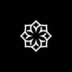 a black and white logo with an abstract flower design on it's front side