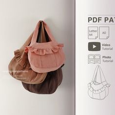 a purse hanging on the wall next to a book