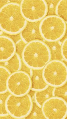 many slices of lemon are arranged together