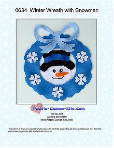 an ornament with a snowman on it's face and the words winter wreath