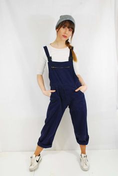 "True vintage unisex cotton workwear overalls worn by labourers in the 70s. Made to last from a high quality and durable cotton twill fabric. Sold out of your size? We design dungarees too >> https://www.etsy.com/uk/listing/846845499/workwear-dungarees-french-cotton FEATURES -Various pockets -Straight leg cut -Adjustable straps. -Leg is regular, roll to fit -Look cool worn oversized -Strap clip style and pocket design may vary slightly from pair to pair (see photos) SIZING Choose your size Blue Utility Bib Front Overalls, Blue Utility Overalls With Bib Front, Blue Cotton Utility Shortalls, Navy Overalls With Pockets, Utility Style Bib Front Jumpsuits And Rompers For Work, Utility Bib Front Jumpsuits And Rompers For Workwear, Workwear Overalls With Bib Front, Blue Bib Front Jumpsuit For Workwear, Blue Bib Front Jumpsuits And Rompers For Work