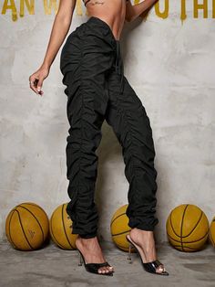 Explore the great outdoors or go for a casual event in style with these Drawstring Cargo Jogger Pants! Crafted from lightweight fabric and featuring a classic drawstring waist in a bold and elegant black color, they offer the utmost comfort and a perfect fit. So whether you’re strolling in the park or tackling a trail, do it in style. Details: Color: Black Style: Casual Pattern Type: Plain Type: Jogger Closure Type: Drawstring Waist Waist Line: High Waist Length: Long Fit Type: Regular Fit Fabri Black Drawstring Joggers For Fall, Spring Sweatpants With Drawstring, Black Sporty Pants With Drawstring, Summer Nylon Drawstring Pants, Black Drawstring Cargo Pants For Spring, Spring Black Cargo Pants With Drawstring, Black High Waist Parachute Pants With Drawstring, High Waist Black Parachute Pants With Drawstring, Black High-waisted Parachute Pants With Drawstring