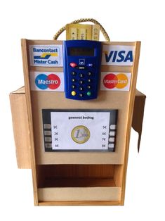 a wooden box with a calculator on top of it and some credit cards