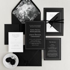 black and white wedding stationery with flowers