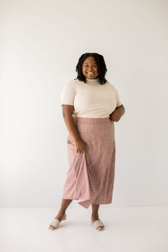 Bringing back all the ditsy florals with the 'Ruth' midi skirt! This midi skirt is adorned in beautiful ditsy florals and is in the perfect dusty mauve color for the fall. Pair with a cozy sweater and low heels for the perfect fall brunch look with friends! 100% Polyester Fully Lined Machine Wash Cold, Gentle Cycle Wash Inside Out Hang or Lay Flat to Dry Do Not Bleach Do Not Dry Clean Iron Low Heat If Needed FINAL SALE: NOT ELIGIBLE FOR RETURN OR EXCHANGE Model Height 5'8" | Wearing Size 2X Wear Fall Brunch, Dusty Mauve, Skirts With Boots, How To Clean Iron, Floral Midi Skirt, Mauve Color, Layered Tops, Mock Neck Top, Cozy Sweater