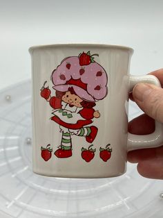 Rare Designer Collection American Greetings StrawBerry Shortcake and Custard Stoneware Mug! This is a beautiful mug. The colors are vivid and bright. No chips, cracks or crazing. Looks brand new! Strawberry Shortcake Merch, Mug Collection, Mug Ideas, Pulseras Kandi, Vintage Strawberry Shortcake, Pretty Mugs, Strawberry Fields, American Greetings, Cute Cups