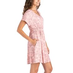 Crafted from lightweight stretch fabric, this dress feels incredibly soft against your skin, making it ideal for all-day wear, all-night outings, and every season. The relaxed A-line style with side pockets adds a touch of casual elegance, while the above-the-knee length keeps it versatile and easy to wear. The epitome of an elevated basic, this dress is designed to be worn with just about anything. Pair it with sandals and your favorite bag for a laid-back daytime look or dress it up with wedges and a jacket for a fun night out. Casual Stretch Dresses For Loungewear, Casual Stretch Dresses For Daywear, Casual Stretch Loungewear Dresses, Casual Mid-length Dress For Beach, Casual Mid-length Beach Dress, Spring Beachwear Mini Dress For Loungewear, Spring Beachwear Mini Dress, Casual Stretch Sundress For Vacation, Knee-length Dresses With Elastic Waistband For Daywear