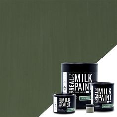 three cans of milk paint next to each other on a white and green striped background