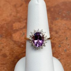 Estate Vintage 14KT Yellow Gold Diamond + Oval Genuine Purple Amethyst Ring Amethyst Measures: 10mm x 8mm Cleaned and like new! Size 7, However Can be sized by us (fee) or your local jeweler Weight: 3.90 Grams 1.92 carat genuine, oval, amethyst Natural Diamonds .45 CT TW SI Clarity, H color Stamped & Hallmarked Great For The Index Finger! Stamped 14K Purple Amethyst Ring, Pearl Accessories, Diamond Halo Ring, White Gold Bracelet, Back Jewelry, White Gold Necklaces, White Gold Earrings, Yellow Gold Bracelet, Yellow Gold Pendants