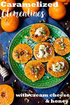 oranges with cream cheese and honey on a green plate