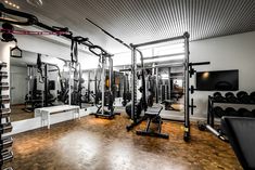 the gym is clean and ready for people to use it as an exercise center in this modern apartment