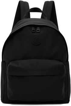 Water-repellent nylon canvas backpack in black. · Buffed leather trim throughout · Leather carry handle · Adjustable padded shoulder straps · Rubberized logo patch at face · Zip pocket at face · Patch pocket at sides · Two-way zip closure · Patch pocket at interior · Nylon taffeta lining · H16 x W13 x D6.5 Supplier color: Black Black Standard Backpack With Logo Patch, Nylon Backpack With Logo Patch, Black Backpack With Logo Patch, Nylon Standard Backpack With Logo Patch, Black Travel Backpack With Logo Patch, Nylon Backpack With Logo For Everyday Use, Everyday Nylon Backpack With Logo, Nylon Logo Backpack, Logo Nylon Backpack