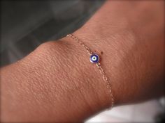 Nice and dainty dark blue evil eye bracelet. The rose gold vermeil framed evil eye charm is about 5mm diameter followed by a 14K rose gold-filled chain. I can do this bracelet on any size, please contact me if you need a lenght not listed. ---------------- Follow this link for the matching ANKLET: https://www.etsy.com/listing/198522025/blue-evil-eye-rose-gold-chain-anklet Sterling Silver Rose Gold Evil Eye Jewelry, Sterling Silver Evil Eye Jewelry In Rose Gold, Rose Gold Sterling Silver Evil Eye Jewelry, Rose Gold Evil Eye Bracelet As Gift, Rose Gold Sterling Silver Jewelry With Evil Eye, Dainty 14k Gold Evil Eye Bracelet, Blue Evil Eye Bracelet, Evil Eye Hamsa, Amulet Charm