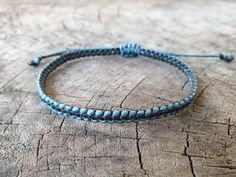 This unisex bracelet or anklet made with waxed cord and sliding knotted for closure, 4mm in width.The Black cord is in the middle, You can change the side cord color.•Size: Choose your size or color cord from the drop-down menu.•✈️ Shipping..The item shipped by Registered Airmail Thailand Post within 3-5 working days after payment received. - United States and Europe: It’s will take about 2-4 weeks to delivery after shipping. - Asia : It’s will take about 1-2 weeks to delivery after shipping.- C Casual Braided Bracelets With Sliding Knot In Waxed Cord, Casual Braided Bracelet With Sliding Knot, Black Anklet, Surf Bracelet, Leather Anklets, Wax Cord Bracelet, Surfer Bracelets, Bracelet Simple, Thread Bracelets